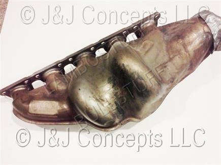 EXHAUST MANIFOLD ass. USED SOLD AS IS - NONREFUNDABLE