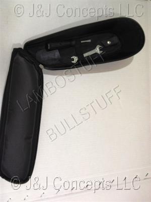 TOOL KIT BAG USED INCLUDES SCREWDRIVER AND WRENCH